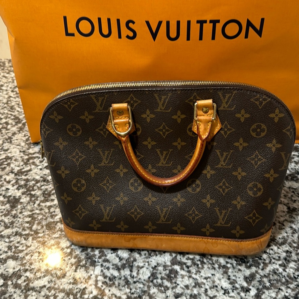 LOUIS VUITTON ALMA PM